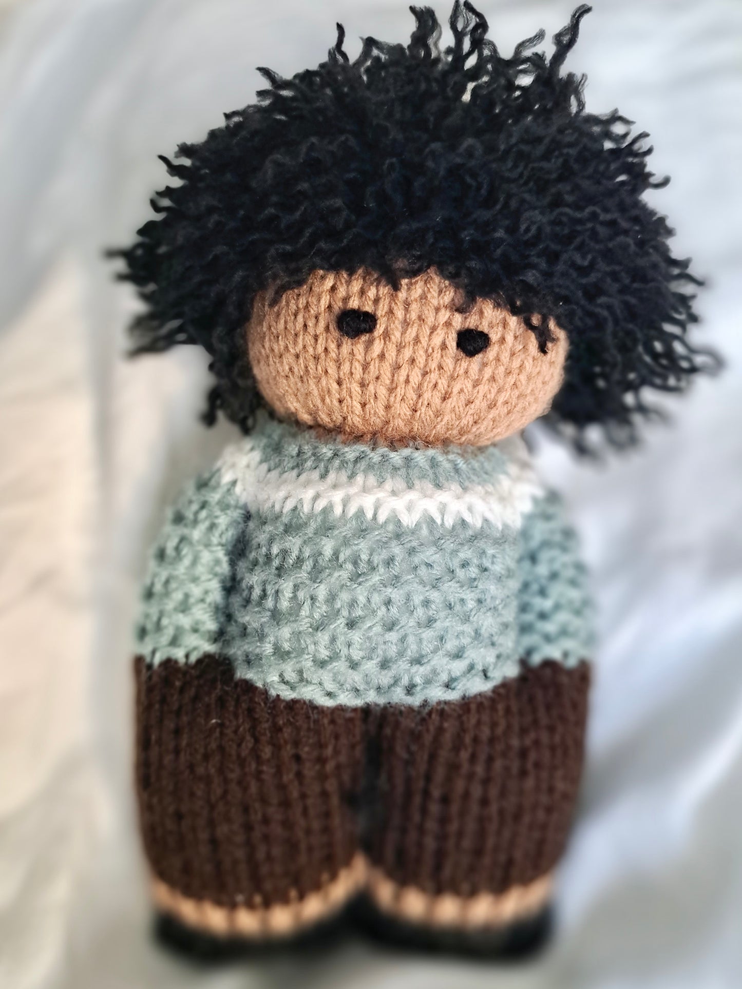 Black knit doll - boy with curls