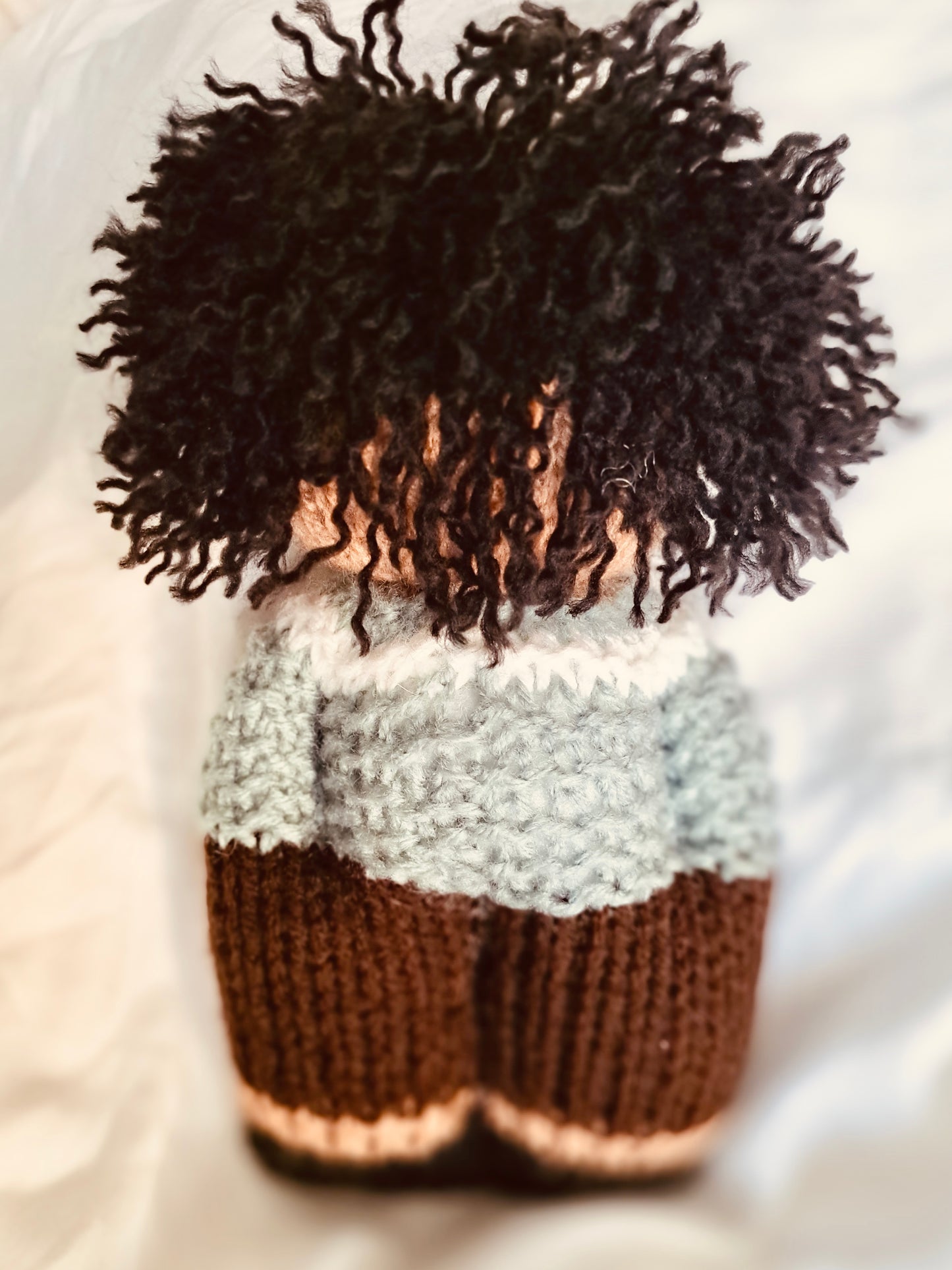 Black knit doll - boy with curls